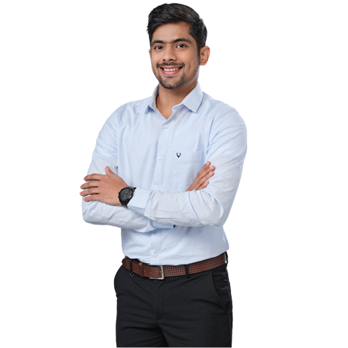 Smiling happy indian student with backpack pointing his finger wall